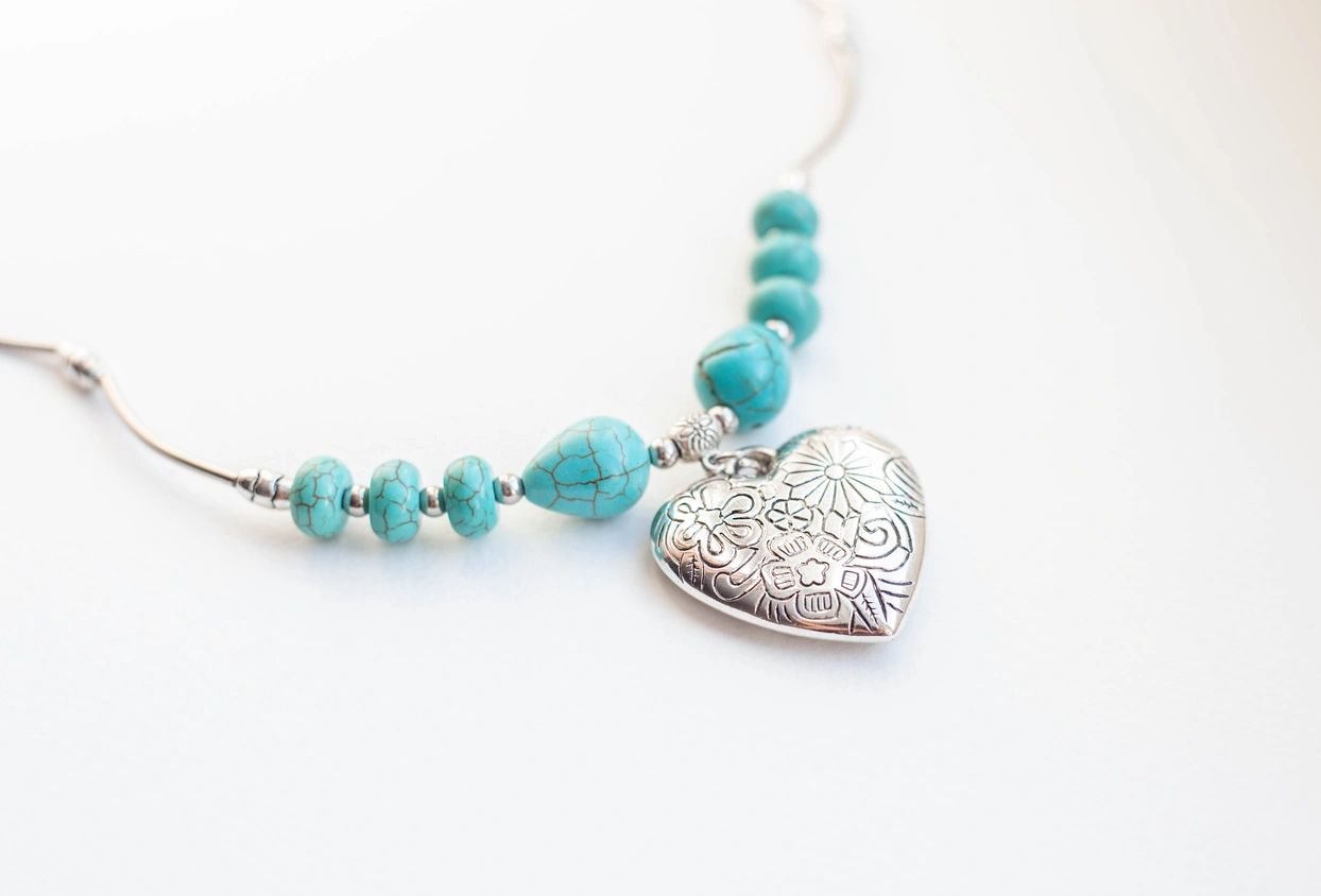 Turquoise beaded necklace with heart pendant